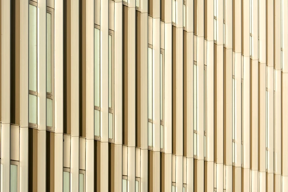 The sleek, modern facade of the Pulse Healthcare Consulting headquarters in Geneva.